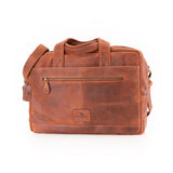 The Leather Messenger Bag Zenith by Vintage Leather Sydney is a brown leather briefcase-style bag with a shoulder strap, two handles, a front zip pocket, and a stitched logo patch, shown on a white background.