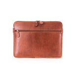 The Leather Laptop Sleeve Signature by Vintage Leather Sydney, in brown leather, features a top zipper closure and an extra front zippered pocket, shown against a white background.