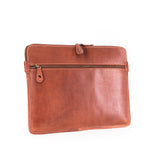 The Leather Laptop Sleeve Signature by Vintage Leather Sydney features a smooth, polished brown leather finish and a front zipper pocket, shown against a white background.