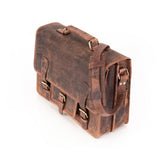 The Leather Messenger Bag Prestige by Vintage Leather Sydney is shown on a white background, featuring brown leather, brass buckles, a shoulder strap, and three front pockets.