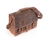 The Leather Messenger Bag Prestige by Vintage Leather Sydney features a vintage-style brown leather look, adjustable shoulder strap, three front buckle closures, and a top handle, shown on a white background.