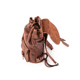 Brown leather backpack on a white background