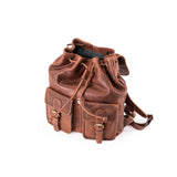 Brown leather backpack on a white background